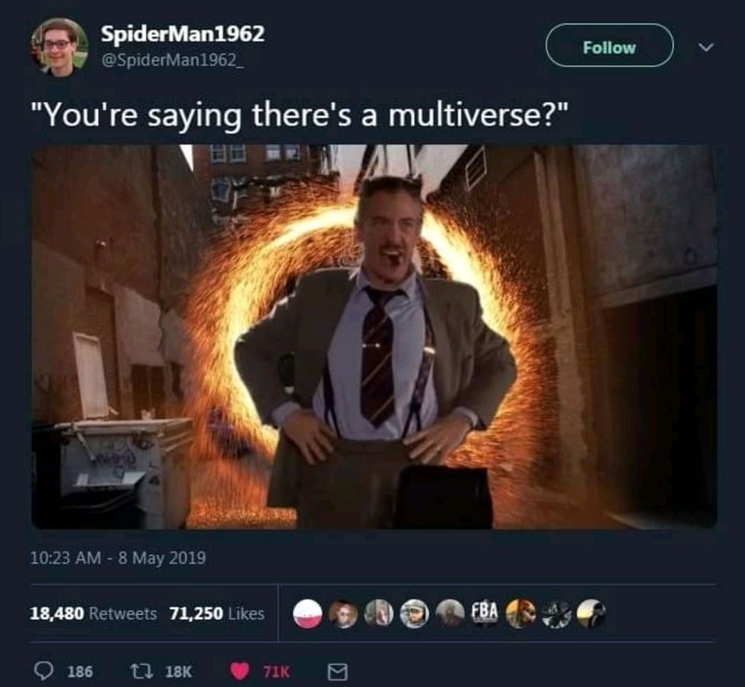 a man in a suit and tie is standing in front of a fire